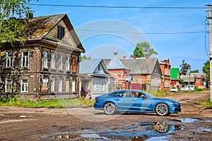 Premium car on a dirt road in Ostashkov